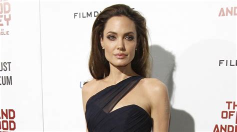 angelina jolienaked|Angelina Jolie nude photographs on sale in London.